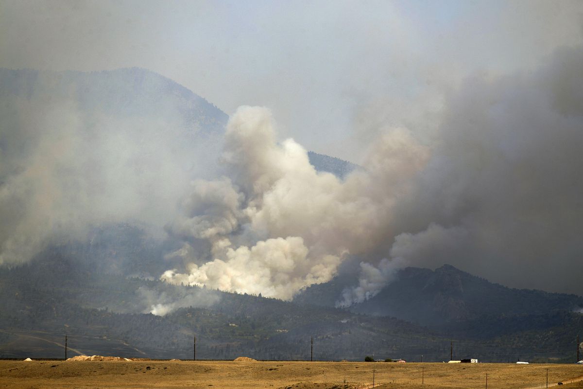 The Spring Creek Fire continues to burn in Costilla County on Tuesday, July 3, 2018 in La Veta, Colo. (Helen H. Richardson / Associated Press)