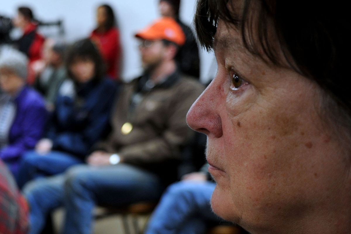 Mullan resident Nancy Johansen listens to Saturday’s news conference at Mullan City Hall after an accident at the Lucky Friday Mine on Friday. (Kathy Plonka)
