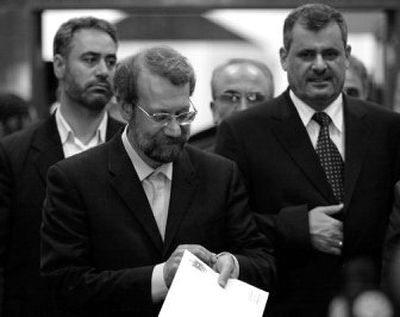 
Iran's top national security official Ali Larijani, center left, arrives in Baghdad Sunday to meet with Iraqi Prime Minister al-Maliki.
 (Associated Press / The Spokesman-Review)