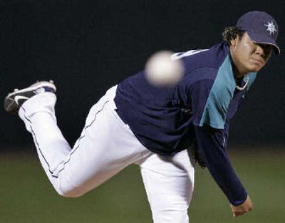Seattle's Felix Hernandez could reach 200 innings before the season is over.
 (Associated Press / The Spokesman-Review)