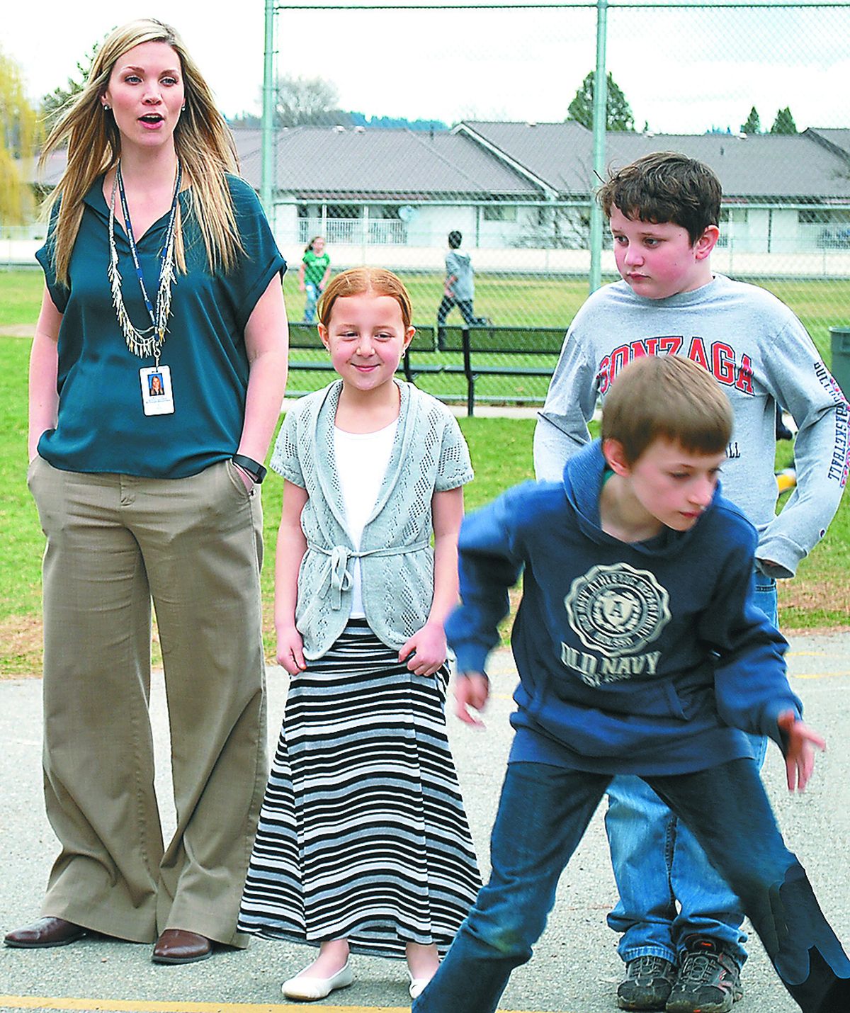 Melissa Scott, counselor at McDonald Elementary, enjoys a game with students during an outdoor break.  (Courtesy photo )