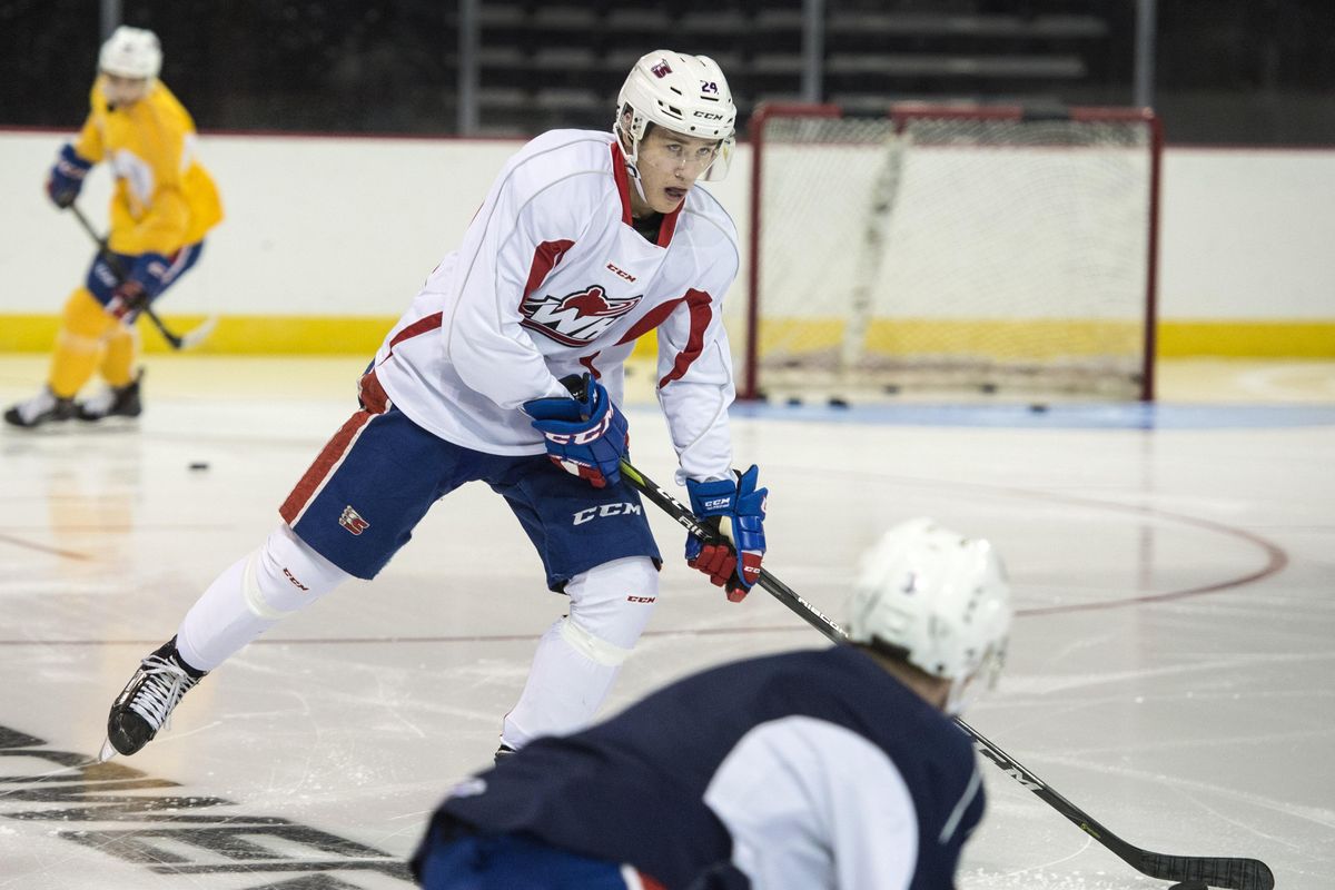 Spokane Chiefs’ Ty Smith looks up the ice during practice Sept. 20, 2017, at the Arena. (Dan Pelle / The Spokesman-Review)