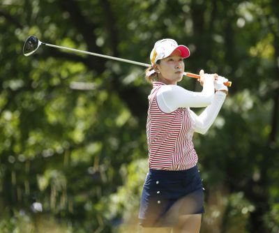 Chella Choi, of South Korea, watches her tee shot on the fifth hole during the third round of the Women's PGA Championship golf tournament at Olympia Fields Country Club Saturday, July 1, 2017, in Olympia Fields, Ill. (Charles Rex Arbogast / Associated Press)