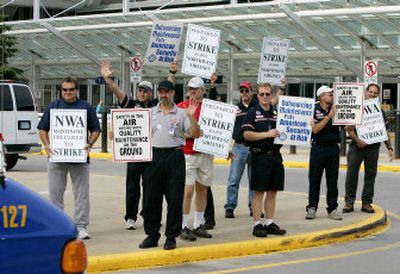 
Northwest Airlines mechanics do some informational picketing at Minneapolis-St. Paul Internaional Airport Wednesday. 
 (Associated Press / The Spokesman-Review)