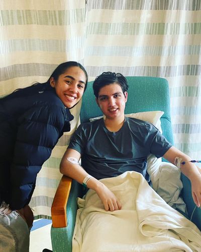 Taija “Tay” Nelms, 22, visits with Justus Danielli, 16, on March 26.  (Courtesy)