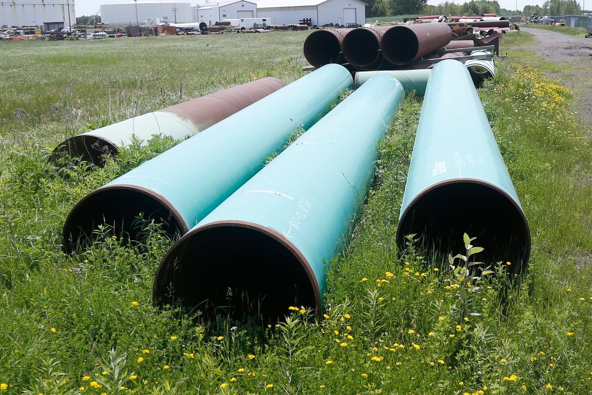 FILE - Pipeline used to carry crude oil is shown at the Superior, Wis., terminal of Enbridge Energy, June 29, 2018. The Biden administration is restoring federal regulations guiding environmental reviews of major infrastructure projects such as highways and pipelines that were scaled back by the Trump administration in a bid to fast-track the projects. A rule finalized Tuesday, April 19, 2022, will restore key provisions of the National Environmental Policy Act, a bedrock environmental law designed to ensure community safeguards during environmental reviews for a wide range of federal projects and decisions, the White House said. (Jim Mone)