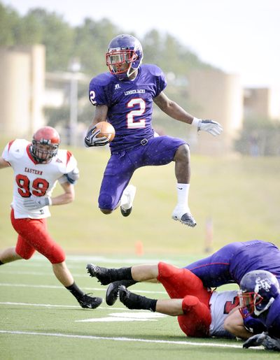 Stephen F. Austin wide receiver Duane Brooks (2) was a thorn in the Eagles’ side, reeling in 15 passes for 124 yards on Saturday.  (Associated Press)