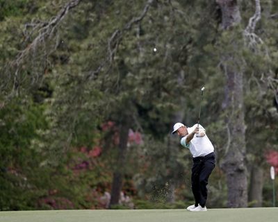 Ernie Els of South Africa plays the 14th hole. The four-time major champion opened the Masters with a nine after six-putting. (Chris Carlson / Associated Press)