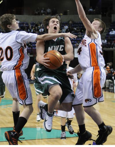 Northwest Christian’s Chase Ramey drives the lane against Napavine.  (Colin Mulvany / The Spokesman-Review)