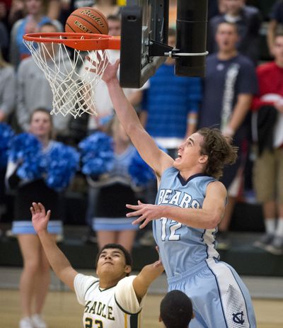 Flying high: Central Valley's Cameron Tucker scores en route to 19 points in Bears’ 73-46 victory over host Shadle Park in a GSL game Friday night. Michael Hannon netted 27 points for CV. GSL boys roundup, C7 (Tyler Tjomsland)