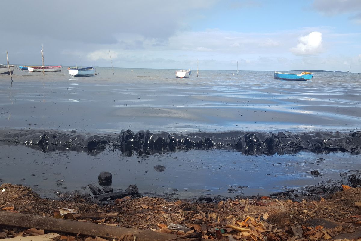 This photo taken and provided by Sophie Seneque, shows oil polluting the foreshore of the public beach in Riviere des Creoles, Mauritius, Saturday Aug. 8, 2020, after it leaked from the MV Wakashio, a bulk carrier ship that recently ran aground off the southeast coast of Mauritius. Thousands of students, environmental activists and residents of Mauritius are working around the clock to reduce the damage done to the Indian Ocean island from an oil spill after a ship ran aground on a coral reef. Shipping officials said an estimated 1 ton of oil from the Japanese ship’s cargo of 4 tons has escaped into the sea. Workers were trying to stop more oil from leaking, but with high winds and rough seas on Sunday there were reports of new cracks in the ship