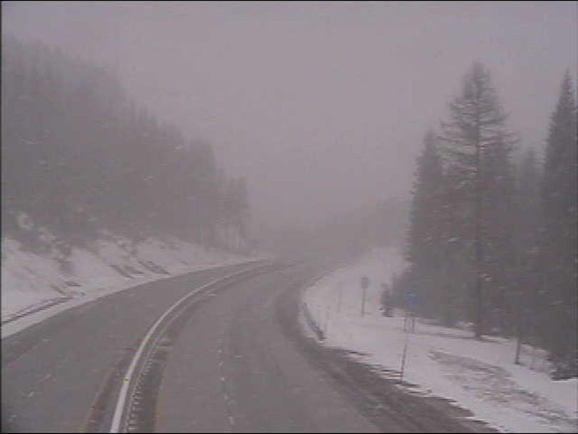 This image from the Idaho Department of Transportation's Web site shows snow falling at Lookout Pass, elevation 4540 feet, at 10:30 a.m. Tuesday, April 28, 2009. The camera is facing east.  (Idaho Department of Transportation)