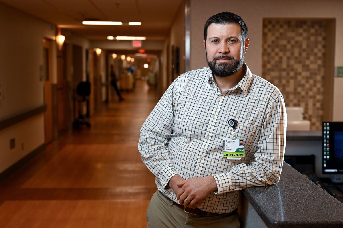 Providence Holy Family Hospital’s surgical acute unit nurse manager Aaron McCarty is an Army veteran and has been with Providence for more than 10 years.  (COLIN MULVANY/THE SPOKESMAN-REVIEW)