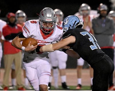 Ferris quarterback Paxton Page (6) is sacked for a loss by Central Valley linebacker Sam Cann (31) during the first half of a high school football game, Friday, Sept. 17, 2021, at Central Valley High School.   (Colin Mulvany/THE SPOKESMAN-REVIEW)