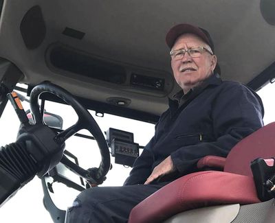 Randy Richards, a 65-year-old farmer near Hope, N.D., poses for a photo Friday, May 10, 2019, at the request of the Associated Press, says the tariff war of the past year and a half has hit hard, and he was angry that more may be coming. Richards says he farms more than 6,000 acres of wheat, barley, soybeans, pinto beans and corn, and says tariffs have driven up the cost of the raw products he needs to run and supply his business and driven down the prices of what he has to sell. (Carmen Richards / AP)