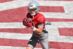 Washington State Cougars wide receiver Carter Pabst (21) hauls in a touchdown pass during a fall camp practice on Tuesday, Aug. 12, 2025, on Gesa Field at Martin Stadium in Pullman, Wash. (Tyler Tjomsland/The Spokesman-Review)