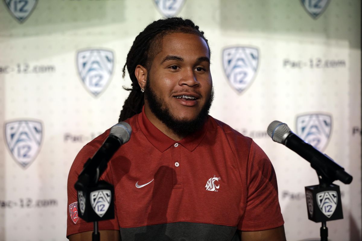 Washington State linebacker Jahad Woods answers questions during the Pac-12 Conference NCAA college football Media Day Wednesday, July 24, 2019, in Los Angeles. (Marcio Jose Sanchez / AP)