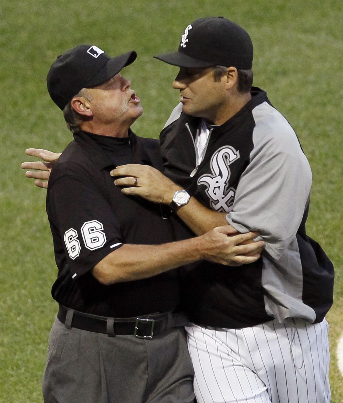 Crew chief Jim Joyce keeps Chicago manager Robin Ventura away from plate umpire Lance Barrett after Barrett ejected catcher A.J. Pierzynski and Ventura. (Associated Press)