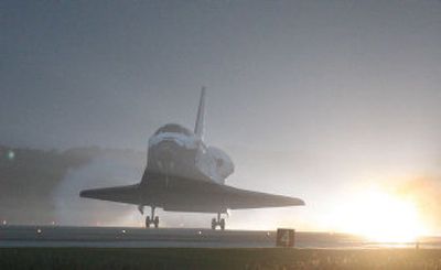 
Space shuttle Discovery lands at Kennedy Space Center on Friday after a 13-day mission. 
 (Associated Press / The Spokesman-Review)
