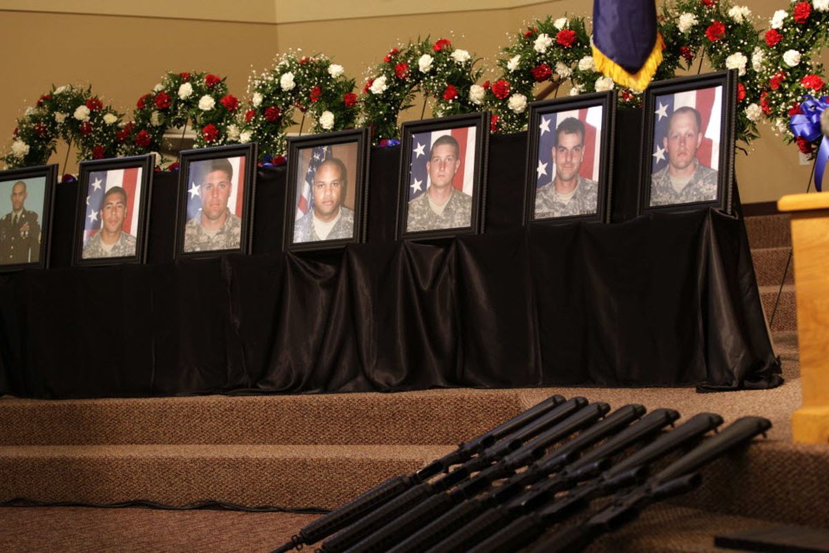 The photographs of seven U.S. Army soldiers killed in action on Oct. 27, 2009, in Afghanistan are displayed Tuesday, Nov. 10, 2009, in a chapel at Fort Lewis prior to a memorial service. From left, the soldiers are, Spc. Luis Gonzalez, Sgt. Fernando Delarosa, Sgt. Dale Griffin, Sgt. Issac Jackson, Sgt. Patrick Williamson, Spc. Jared Stanker, and Pfc. Christopher Walz. (Associated Press)