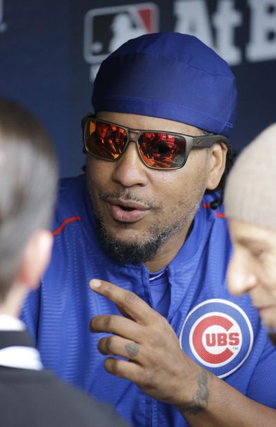 Manny Ramirez isn’t listed on either the coaching or support staffs for the Chicago Cubs, yet nearly every hitter on the roster checks in with him regularly. (Nam Y. Huh / AP)
