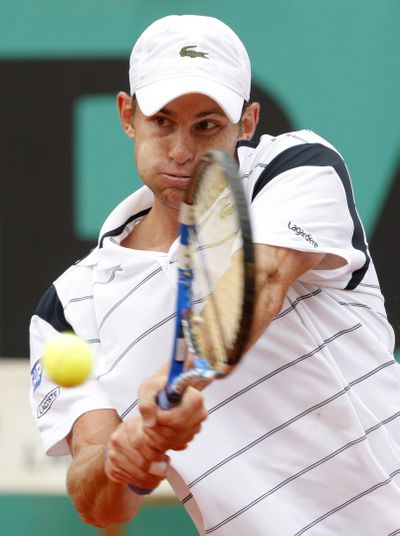 Andy Roddick overcame rain and his subpar serving to put away Blaz Kavcic in the second round of the French Open.  (Associated Press)