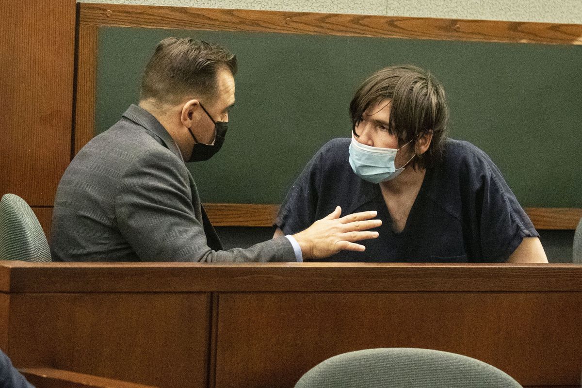 Defense attorney Dustin Marcello, left, speaks with Brent Wilson, founding member of Panic! At the Disco, at the Regional Justice Center in Las Vegas on Feb. 10, 2021. Marcello, said in court Wednesday, Feb. 17, he expects an indictment to be filed within days in U.S. District Court in Las Vegas. Wilson has been jailed since his arrest Jan. 22 on felony drug possession and gun charges.  (Bizuayehu Tesfaye)