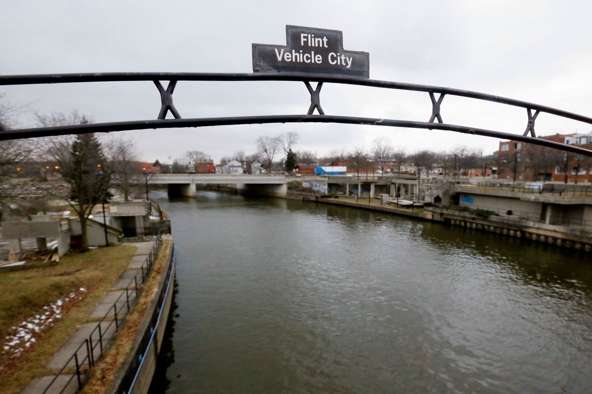FILE - This Jan. 26, 2016, file photo, shows the Flint River in Flint, Mich. A judge on Wednesday, Nov. 10, 2021, approved a $626 million settlement for Flint residents and others who were exposed to lead-contaminated water.  (Carlos Osorio)