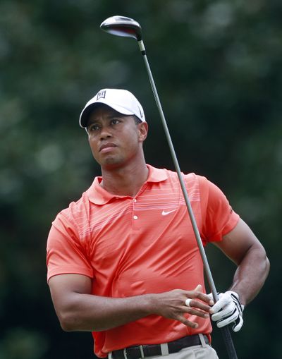 Tiger Woods was named the 4-1 favorite to win the Masters by a British bookmaker.  (FILE Associated Press)