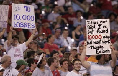 
Phillies fans acknowledge the team's impending 10,000th loss Sunday. Associated Press
 (Associated Press / The Spokesman-Review)