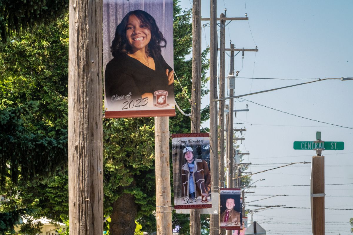 Reardan is continuing a tradition that started during COVID to display portraits of each graduating senior on utility poles in town along Highway 2. There are 21 double-sided banners featuring 42 seniors.  (COLIN MULVANY/THE SPOKESMAN-REVIEW)