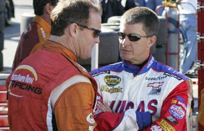 
Kenny Wallace, left, and Ward Burton chat it up before the start of qualifying for the Subway 500.
 (Associated Press / The Spokesman-Review)