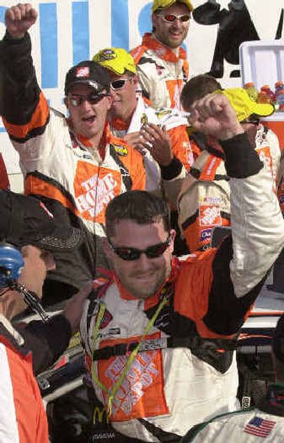 
Tony Stewart, bottom, celebrates after winning the NASCAR Sirius at the Glen race in Watkins Glen, N.Y.
 (Associated Press / The Spokesman-Review)