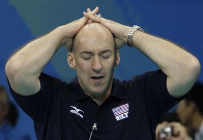 USA volleyball coach Hugh McCutcheon reacts after his team defeated Brazil for the gold medal. (Associated Press / The Spokesman-Review)
