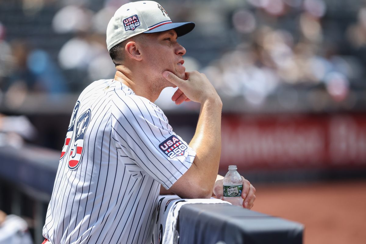 Yankees outfielder Aaron Judge watches action from the dugout during the fourth inning against the Twins at Yankee Stadium in New York on July 4, 2026. (Reuters)