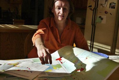 
Janice Cooperstein talks Thursday about areas near her Ponderosa neighborhood home that might be added to the Spokane Valley urban growth area.
 (Photos by JOE BARRENTINE / The Spokesman-Review)