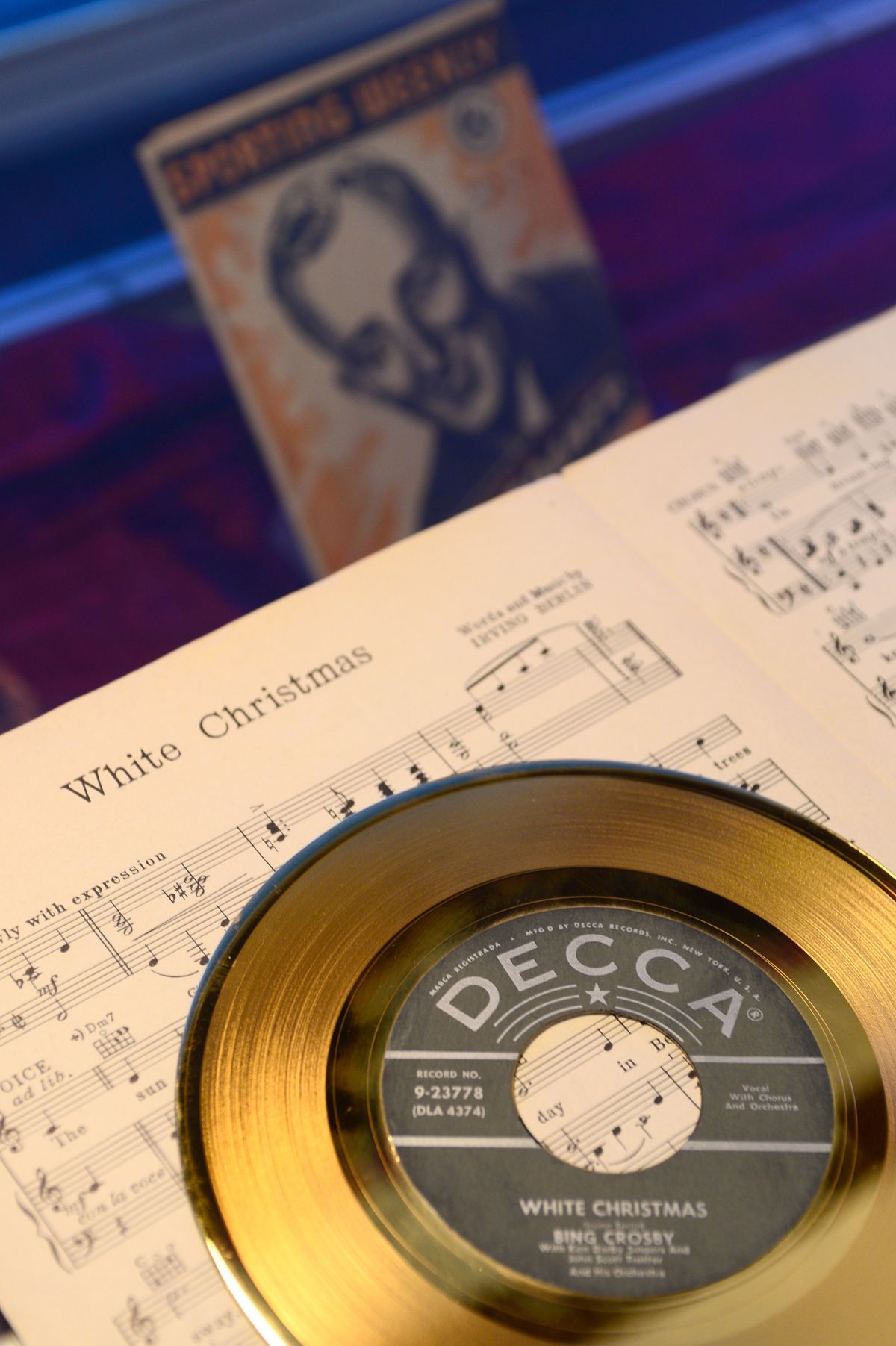 This is the gold record Bing Crosby received for record sales of his song "White Christmas" and the sheet music from when it was first released. These are displayed with many other pieces of memorabilia in the Bing Crosby House Museum on the Gonzaga University campus.  The museum will reopen Saturday for the first time since closing March 2020 due to the pandemic.  (JESSE TINSLEY/The Spokesman-Review)