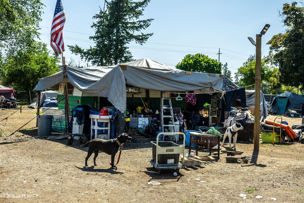 In late May, the city of Spokane and Washington state agreed that Camp Hope, where fewer than 20 people remained, would close by the end of June.  (COLIN MULVANY/THE SPOKESMAN-REVI)