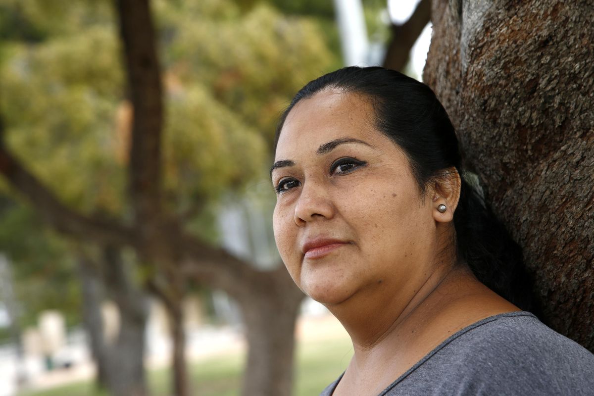 Blanca Chico, an uninsured patient, uses Planned Parenthood Arizona to get her health services pauses in a nearby park near to where she lives on Tuesday, May 9, 2017, in Scottsdale, Ariz. Republican lawmakers in Arizona and Iowa took steps to join a growing list of states that have acted to curtail public funding for Planned Parenthood, which is the leading provider of abortions in the U.S. but also provides a range of other health services that would be affected by the funding cuts. (Ross D. Franklin / Associated Press)