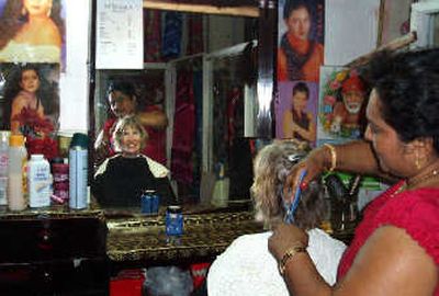 
Janet Boehme gets a haircut while on a trip to Fiji. 