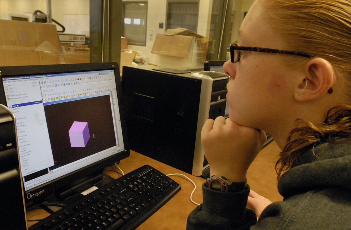 Junior Ashley Bueckers uses 3-D parametric modeling software to help solve the puzzle cube challenge as a part of the new engineering curriculum at West Valley High School.  (J. BART RAYNIAK / The Spokesman-Review)