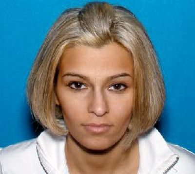 This photo released Thursday, Jan. 2, 2020, by the Somerset Police Department shows Tracy Milanovich, owner of Tracy's Psychic Palm Reader, of Somerset, Mass. She is charged with stealing more than $70,000 from a client by telling the woman her 10-year-old daughter was possessed by a demon and she needed the money to banish the spirit, police said. (Associated Press)