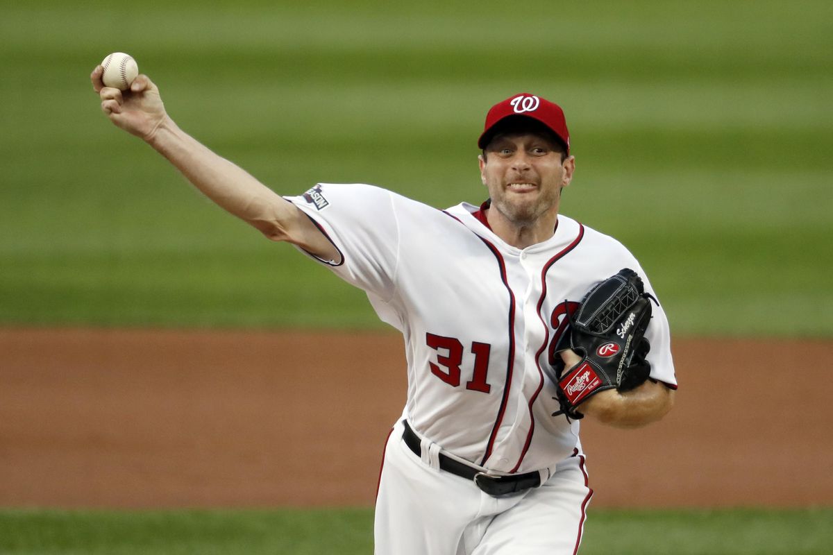 Washington Nationals starting pitcher Max Scherzer throws during the first inning of Game 1 of baseball’s National League Division Series against the Los Angeles Dodgers at Nationals Park, Friday, Oct. 7, 2016, in Washington. (Alex Brandon / Associated Press)