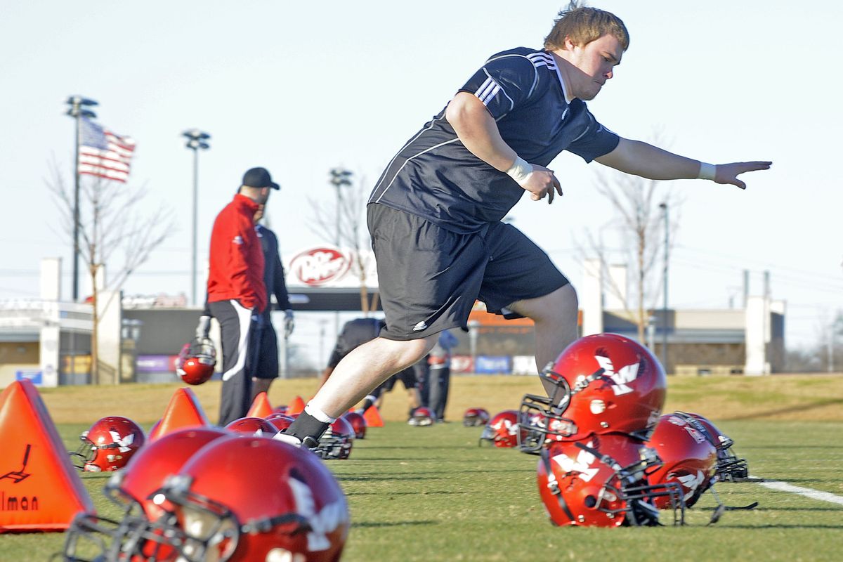 Eastern Washington offensive lineman Will Post stands out on the field.  (Christopher Anderson / The Spokesman-Review)