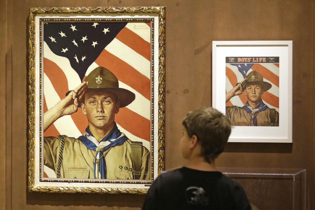 Andrew Garrison, 11, of Salt Lake City, looks over the Rockwell exhibition at the Mormon Church History Museum on July 22, 2013, in Salt Lake City, Utah. The Mormon church‘s new youth program it will roll out in 2020 when it cuts all ties with Boy Scouts of America will still include outdoor and adventure activities even as the initiative becomes more gospel-focused, the faith confirmed Friday, Sept. 21, 2018. (Rick Bowmer / Associated Press)