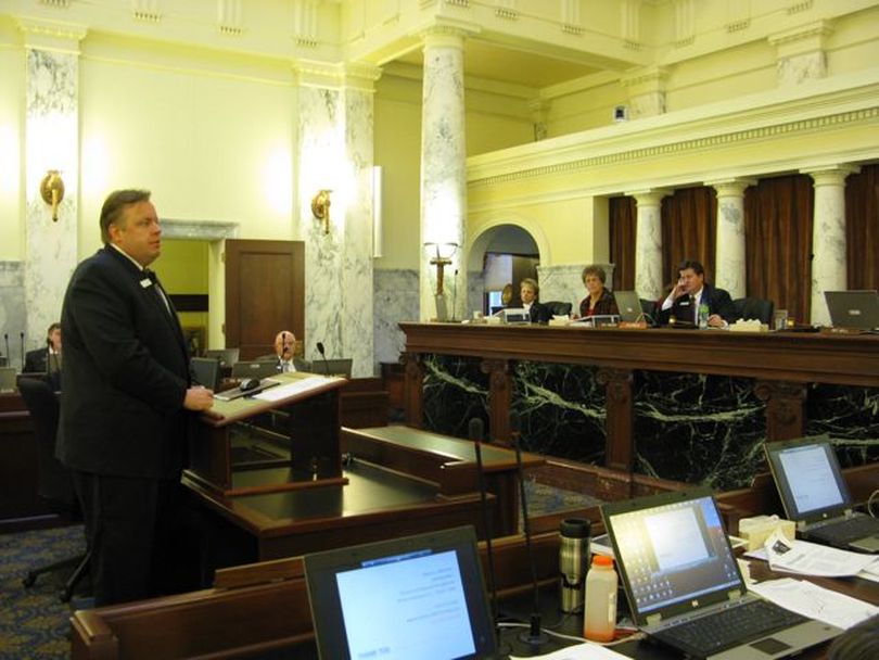 Wayne Hammon, Gov. Butch Otter's budget chief, presents the budgets for the executive office of the governor and the state Division of Financial Management to lawmakers Friday. Among money-saving moves he shared: Interns now are unpaid. (Betsy Russell)