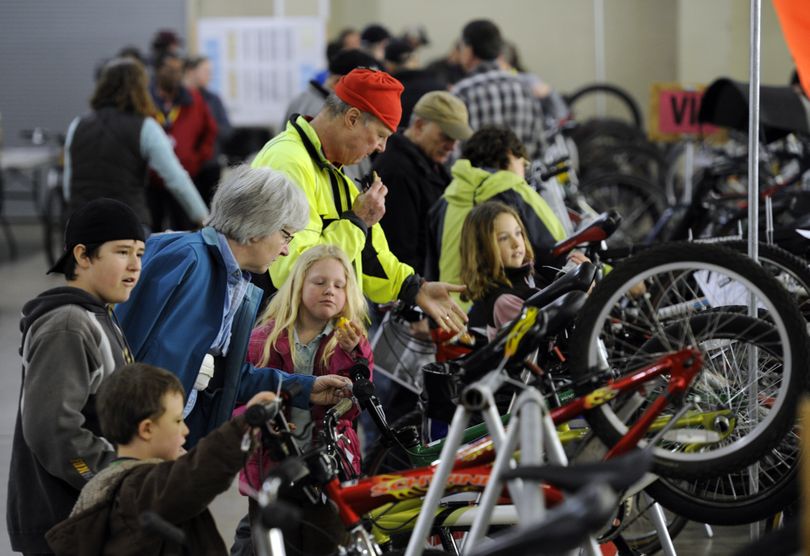 Expect families, fitness enthusiasts, cycle buffs and first-timers to mob the racks of used bikes at the Spokane Bike Swap at the Spokane Fair and Expo Center in April. (File)
