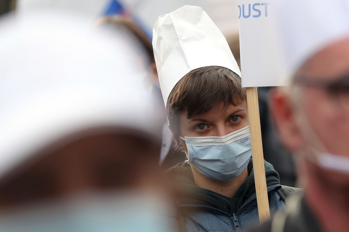 A protester wears a chef