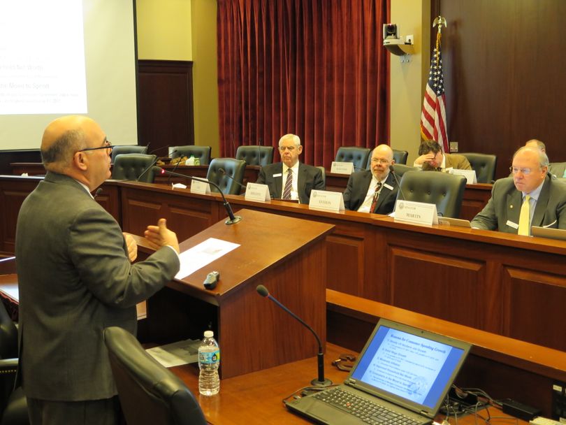 Derek Santos, Idaho Gov. Butch Otter's chief economist, addresses state lawmakers on Thursday. (Betsy Z. Russell)