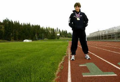 
Since East Valley High School senior Keith Holt moved from the gridiron to the lanes of a running track he has excelled and recently won big at an international track meet in Australia. 
 (Brian Plonka / The Spokesman-Review)